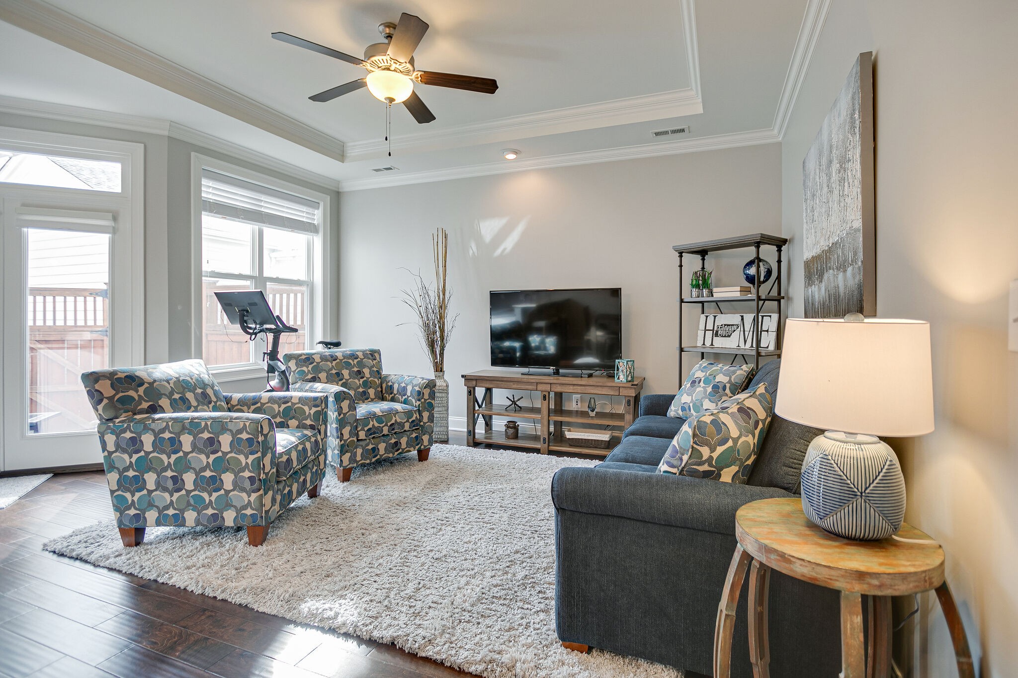 413 Courfield Drive Franklin, TN 37064 - Photo 6 of 27 a living room with furniture and a flat screen tv