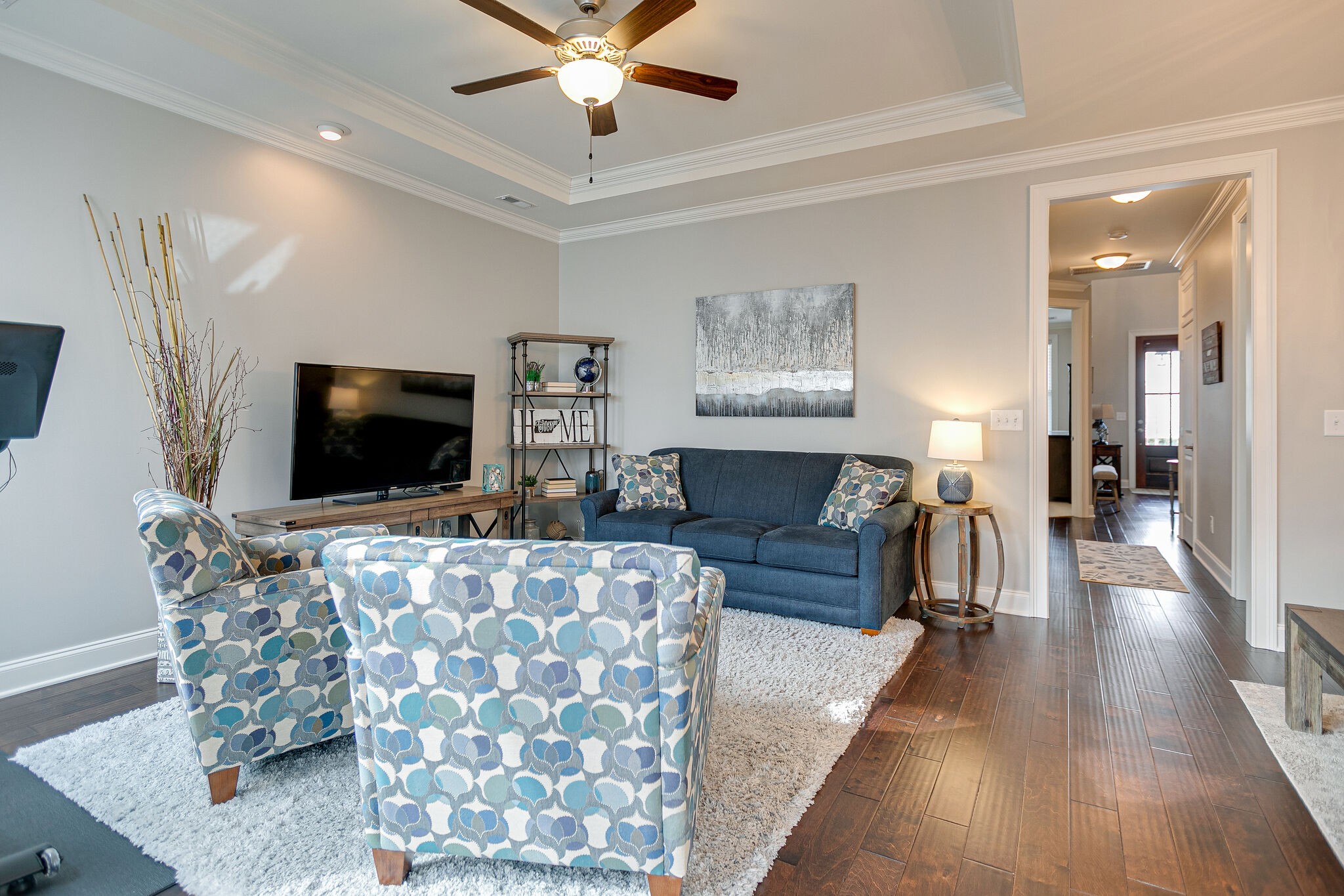 413 Courfield Drive Franklin, TN 37064 - Photo 7 of 27 a living room with furniture and a flat screen tv