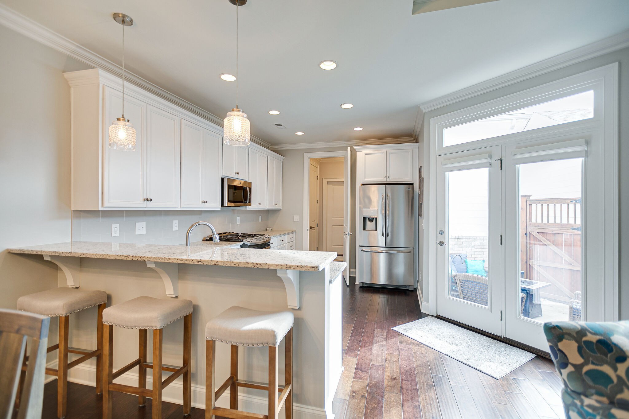 413 Courfield Drive Franklin, TN 37064 - Photo 9 of 27 a kitchen with refrigerator and cabinets