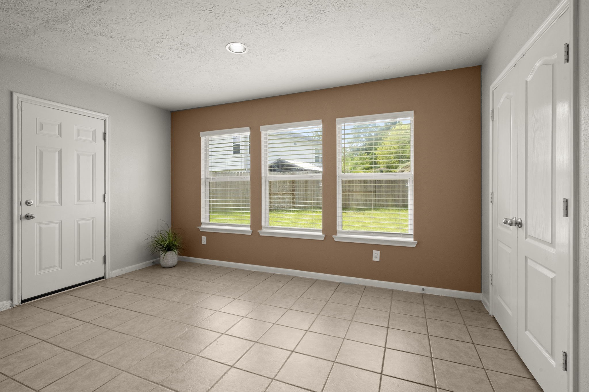 19819 Rippling Brook Lane Tomball, TX 77375 - Photo 11 of 29 a view of an empty room with a window