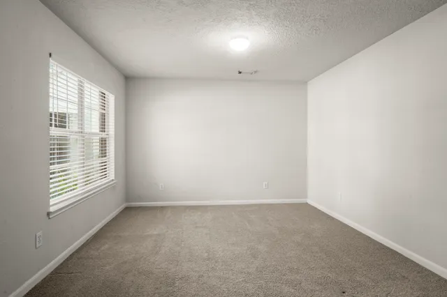 a bathroom with a sink a mirror and shower