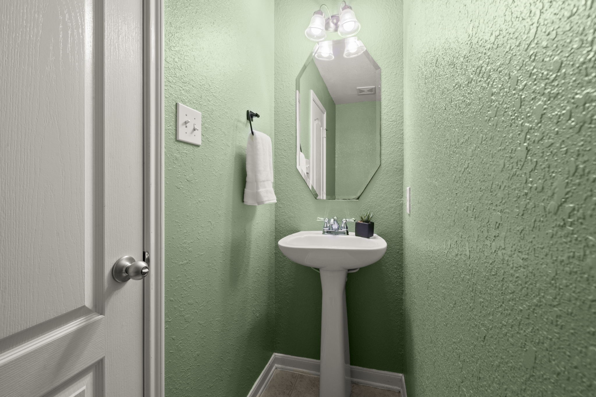 19819 Rippling Brook Lane Tomball, TX 77375 - Photo 16 of 29 a bathroom with a sink a mirror and shower