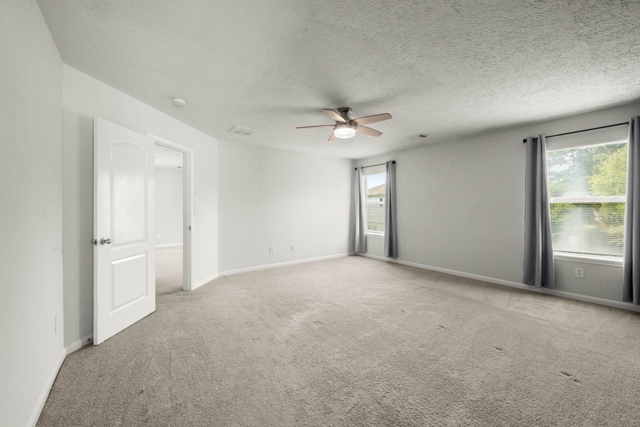 19819 Rippling Brook Lane Tomball, TX 77375 - Photo 18 of 29 a view of an empty room with a window
