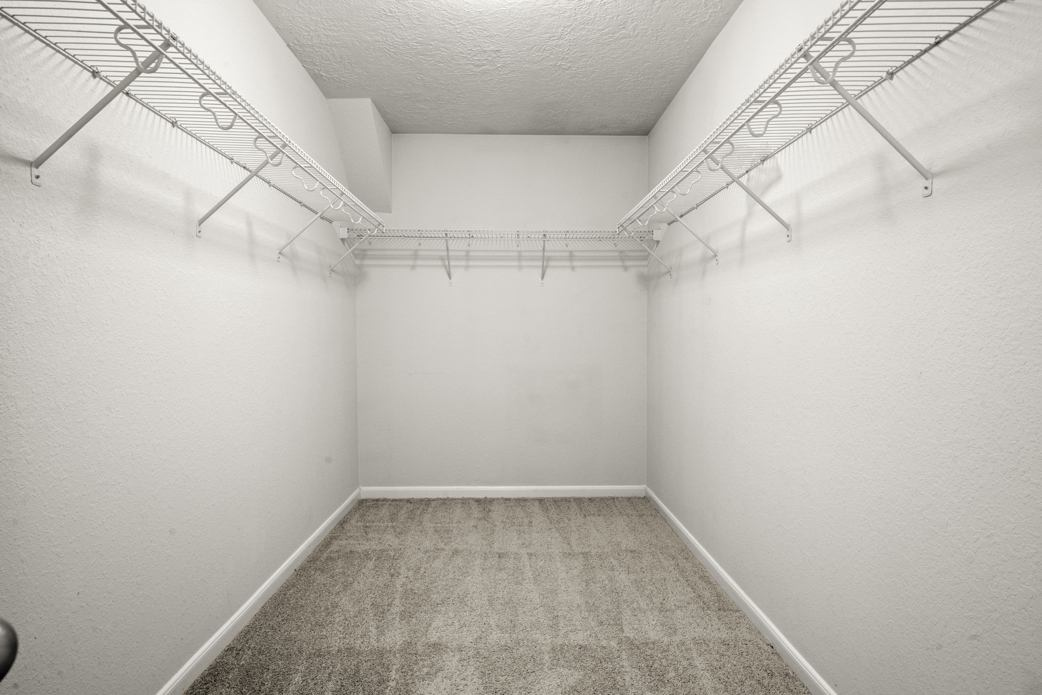 19819 Rippling Brook Lane Tomball, TX 77375 - Photo 19 of 29 a view of a room with racks on the wall