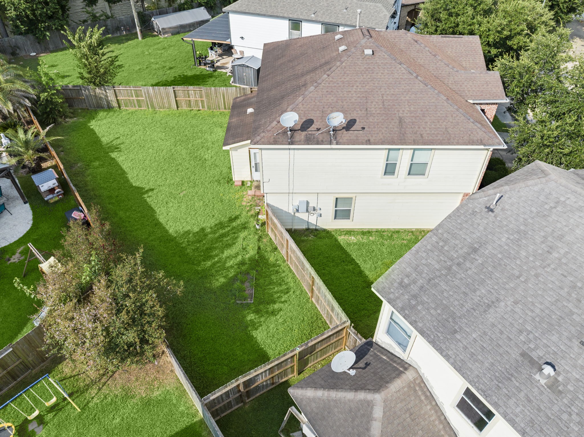 19819 Rippling Brook Lane Tomball, TX 77375 - Photo 26 of 29 an aerial view of a house with a garden