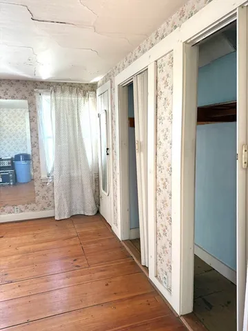 a view of a room that has a window in it