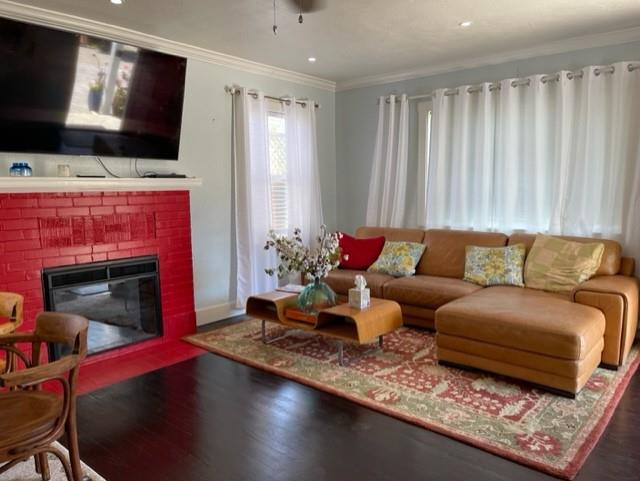 2425 3rd Street Napa, CA 94559 - Photo 12 of 36 a living room with furniture a flat screen tv and a fireplace