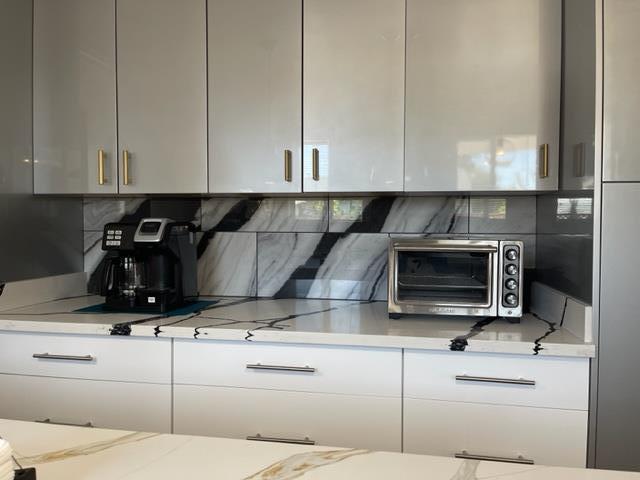 2425 3rd Street Napa, CA 94559 - Photo 17 of 36 a kitchen with a stove microwave and cabinets