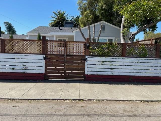 2425 3rd Street Napa, CA 94559 - Photo 2 of 36 a front view of a house with a garden