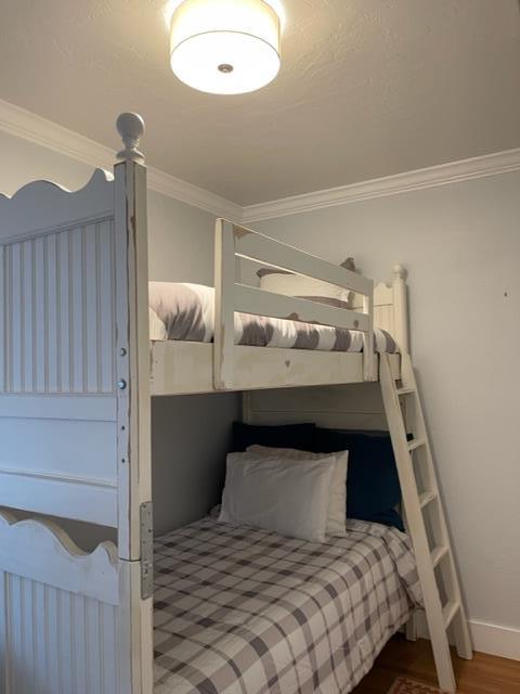 2425 3rd Street Napa, CA 94559 - Photo 26 of 36 a bedroom with a bed and a chandelier