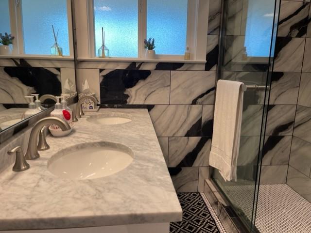 2425 3rd Street Napa, CA 94559 - Photo 31 of 36 a bathroom with a sink and a mirror