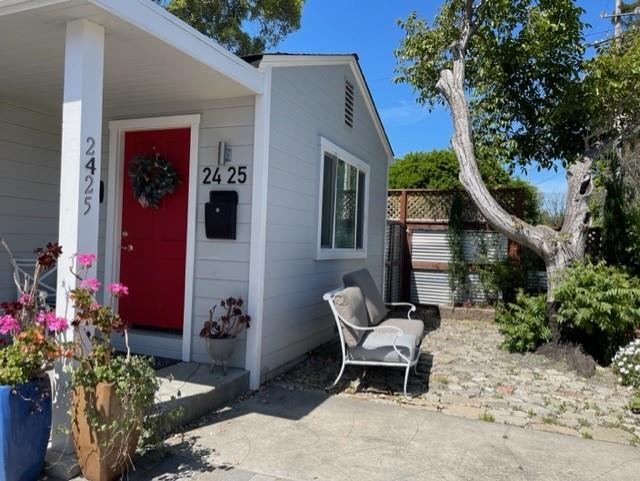 2425 3rd Street Napa, CA 94559 - Photo 6 of 36 a bench is sitting in front of a house