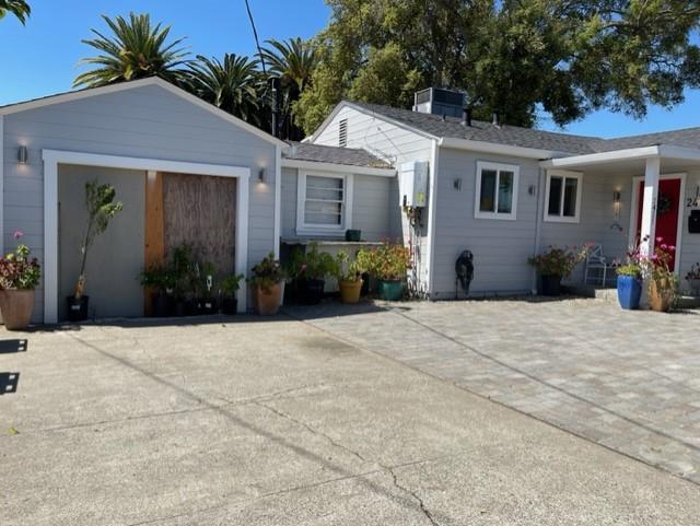 2425 3rd Street Napa, CA 94559 - Photo 7 of 36 a front view of a house with a yard
