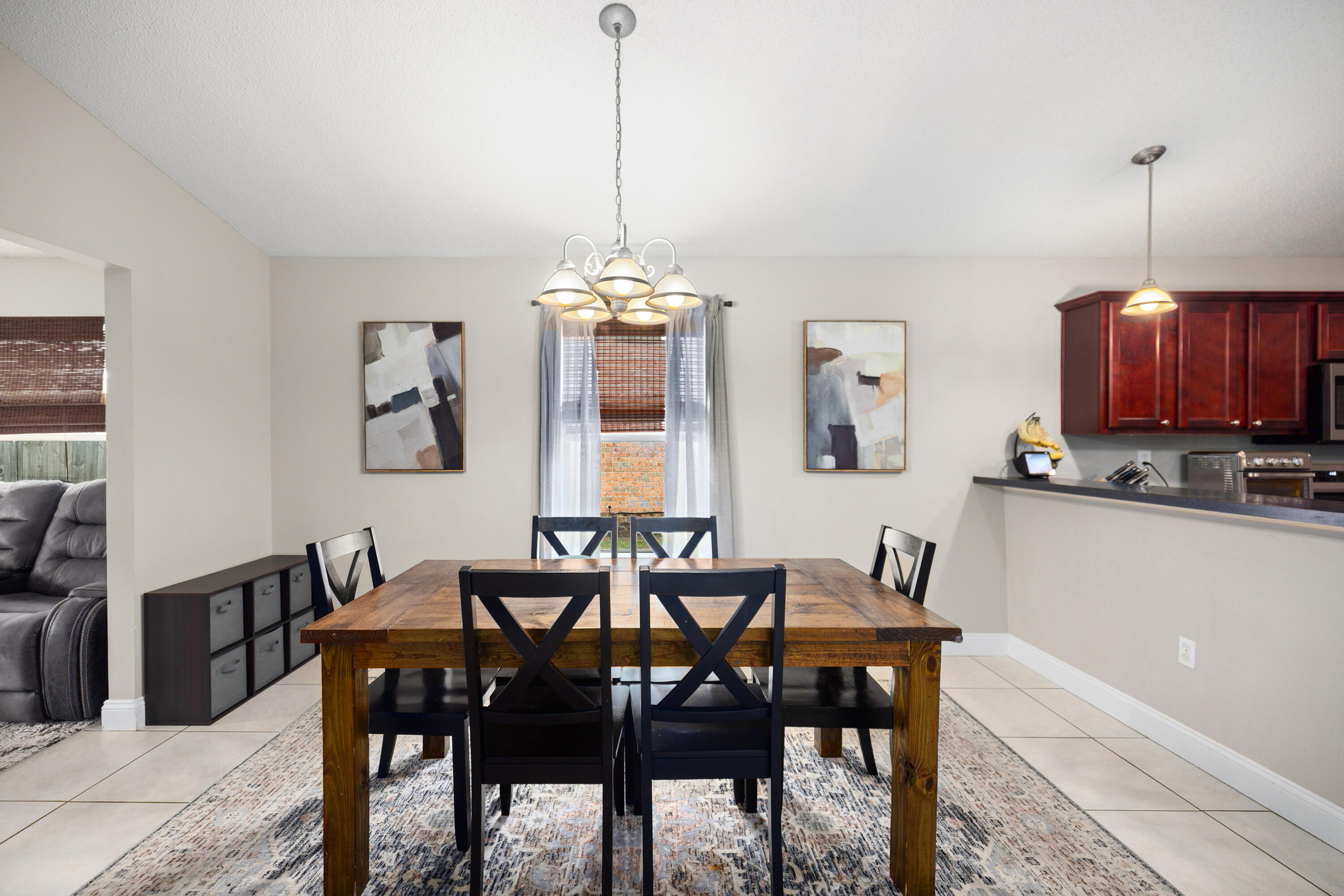 202 Limestone Circle Crestview, FL 32539 - Photo 3 of 49 a view of a dining room with furniture