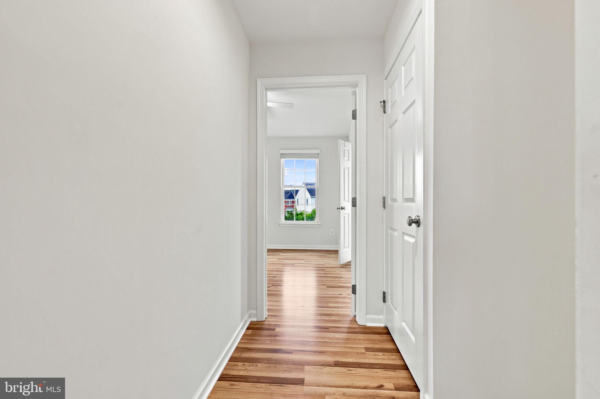 25156 Monteith Terrace Chantilly, VA 20152 - Photo 51 of 72 Bright and inviting hallway view.