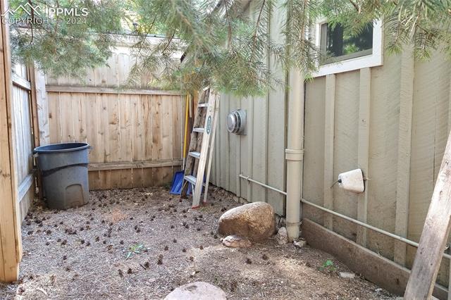 1529 West Cheyenne Road Colorado Springs, CO 80906 - Photo 17 of 17 View of extra yard area behind bathroom exterior and back patio