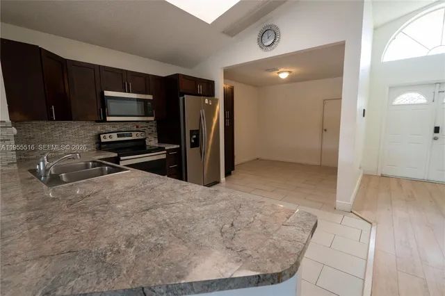 $449,000 | 9936 West Daffodil Lane, Miramar, FL 33025