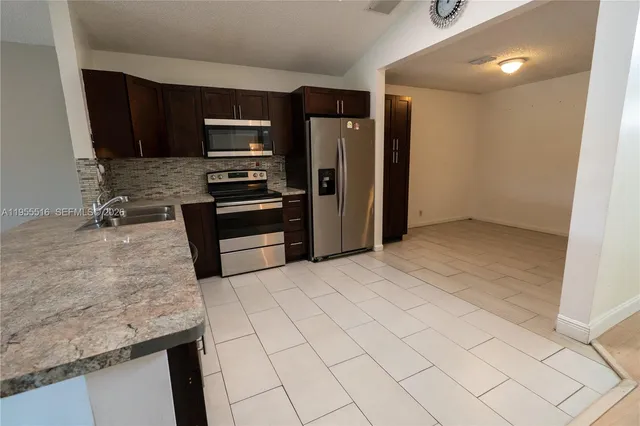 $449,000 | 9936 West Daffodil Lane, Miramar, FL 33025