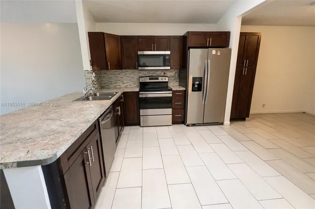 $449,000 | 9936 West Daffodil Lane, Miramar, FL 33025