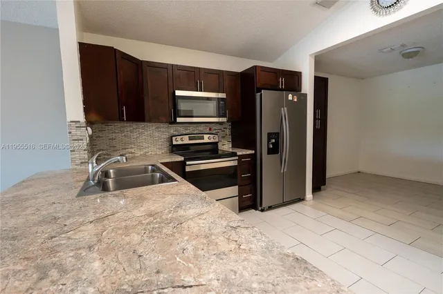 $449,000 | 9936 West Daffodil Lane, Miramar, FL 33025
