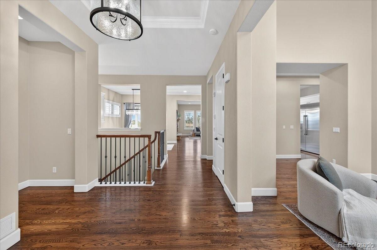 10693 Featherwalk Way Highlands Ranch, CO 80126 - Photo 11 of 50 wooden floor with a window