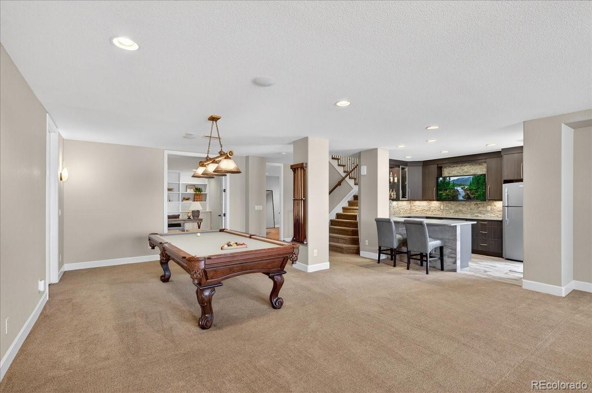 10693 Featherwalk Way Highlands Ranch, CO 80126 - Photo 31 of 50 a room with furniture and pool table