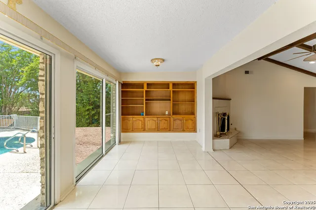 a view of a livingroom with a fireplace