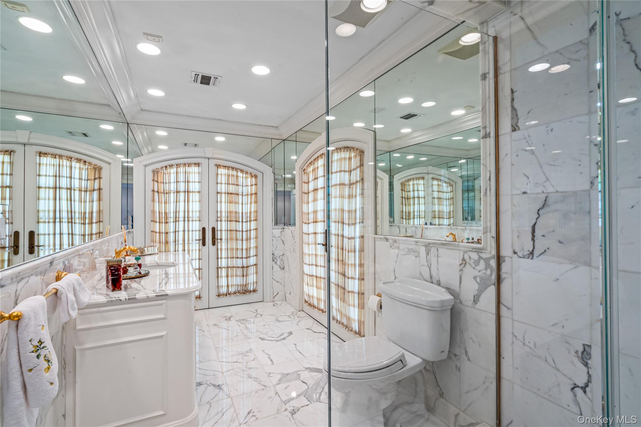 167 Brookville Road Glen Head, NY 11545 - Photo 17 of 31 Jack and Jill Full bath with french doors to juliet balconies