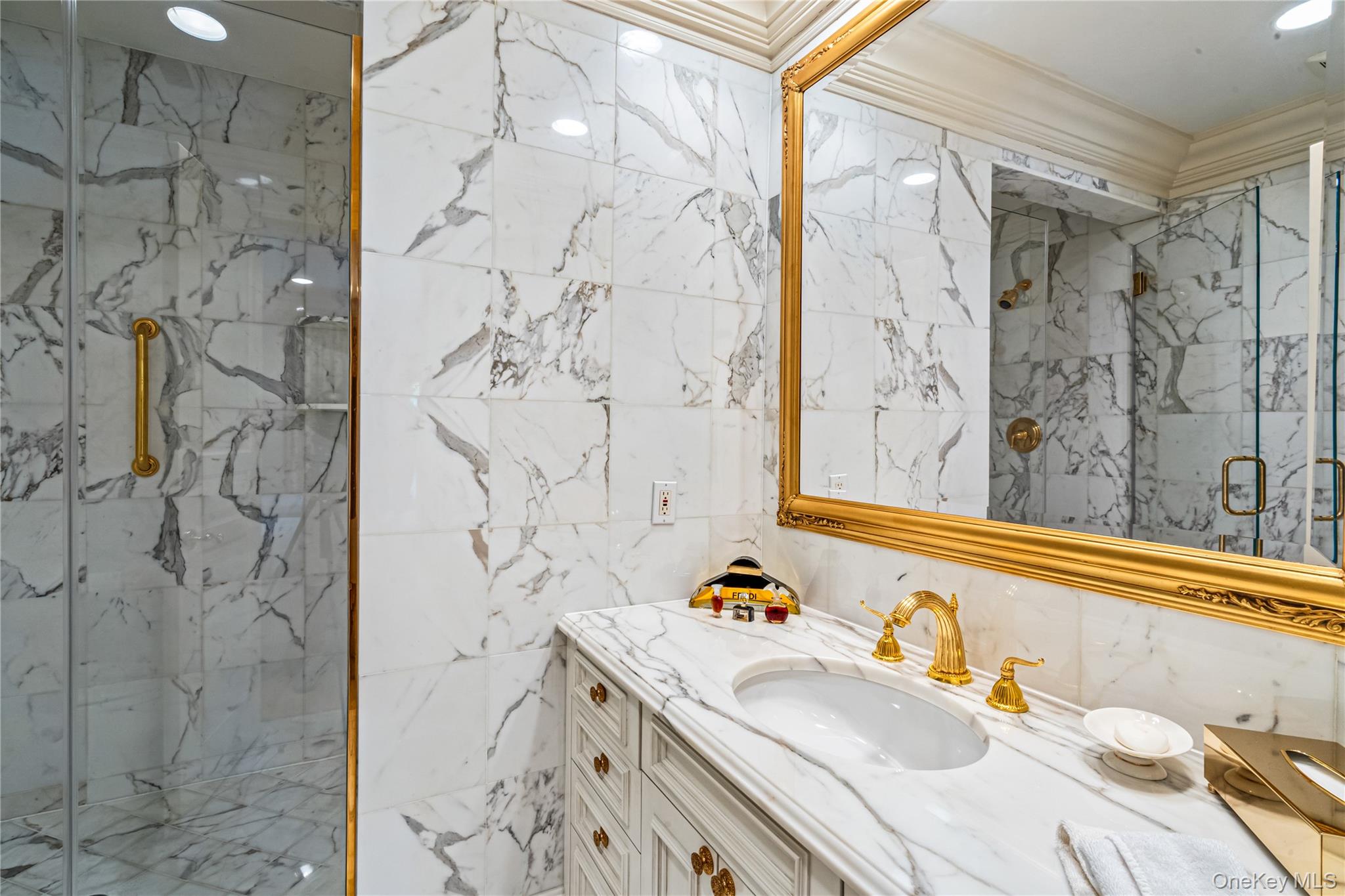 167 Brookville Road Glen Head, NY 11545 - Photo 20 of 31 Ensuite bath with onyx marble tile