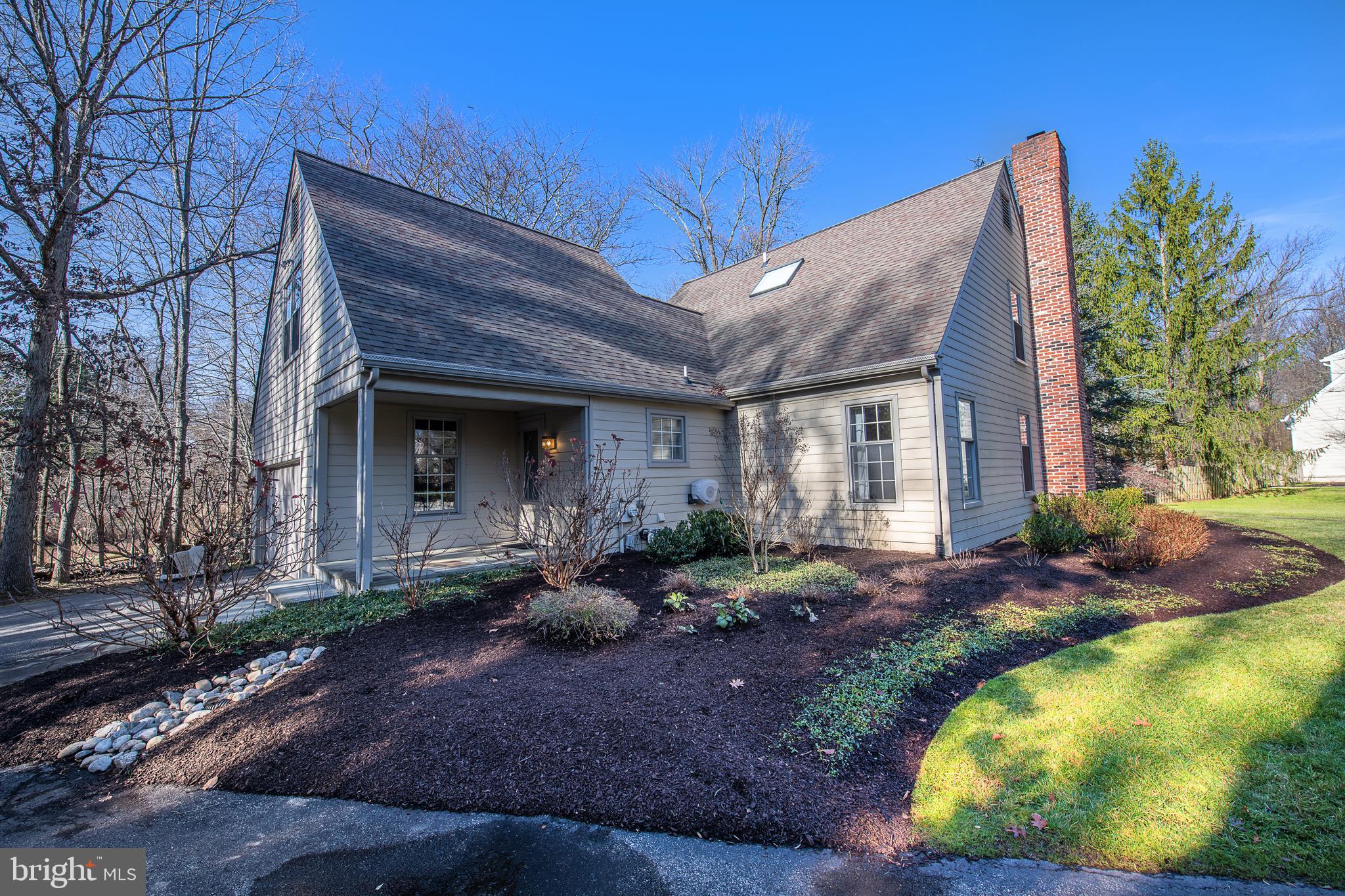 411 Chester Road Devon, PA 19333 - Photo 2 of 48 Side elevation, covered portico and 2 car att gar.