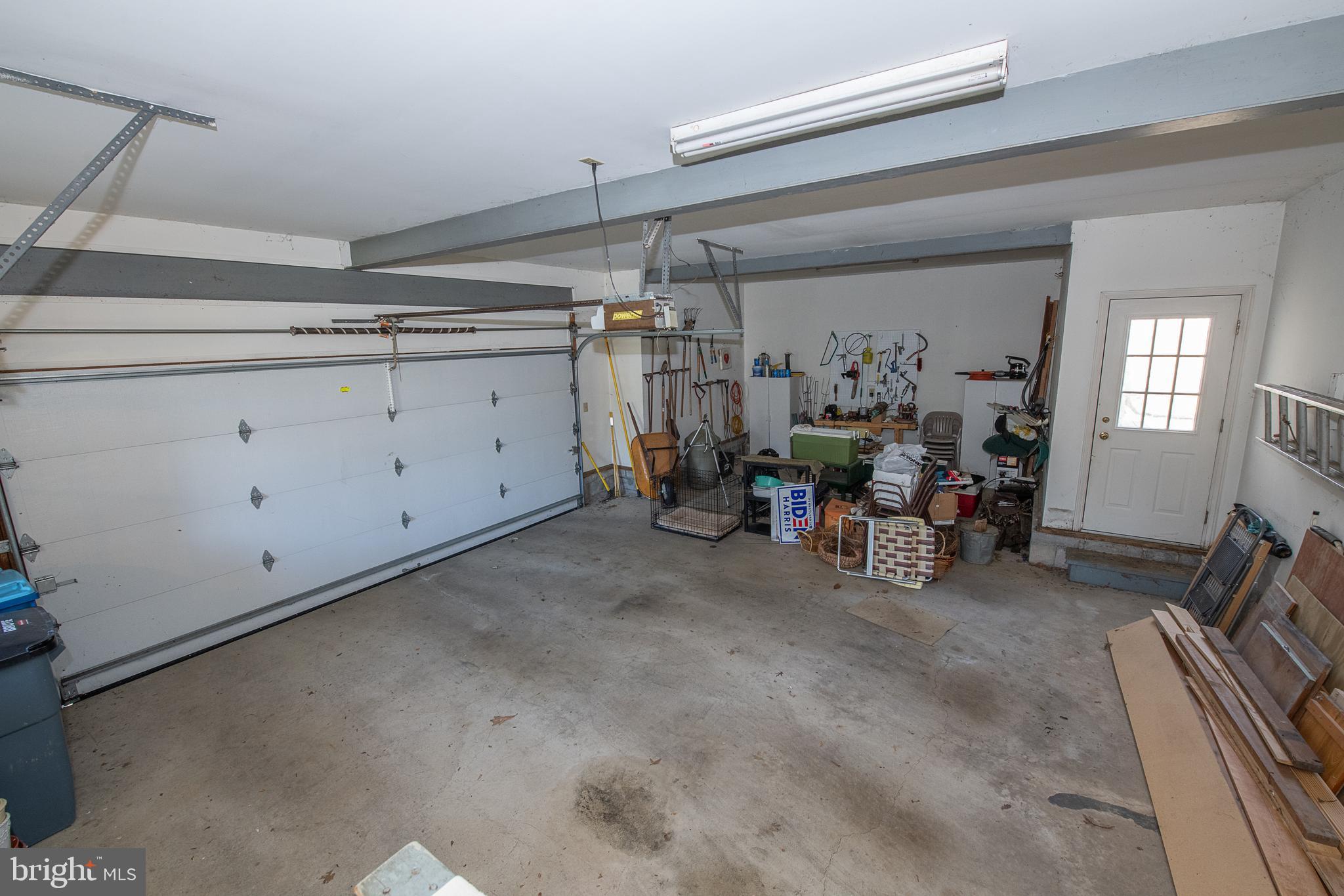 411 Chester Road Devon, PA 19333 - Photo 45 of 48 Two car side load attached garage w door to deck