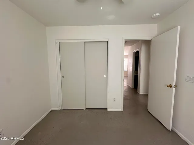 an empty room with closet
