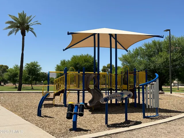 a view of a park with slide