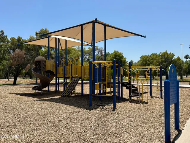 a view of a swimming pool with a sitting space