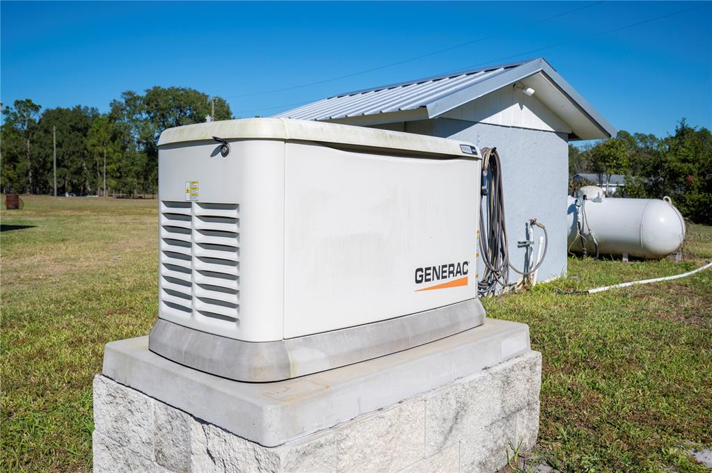 2525 Ranchland Acres Road Lakeland, FL 33809 - Photo 37 of 68 a front view of a house with garden
