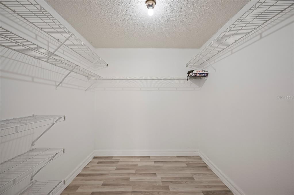 2525 Ranchland Acres Road Lakeland, FL 33809 - Photo 50 of 68 a view of a room with racks on the wall