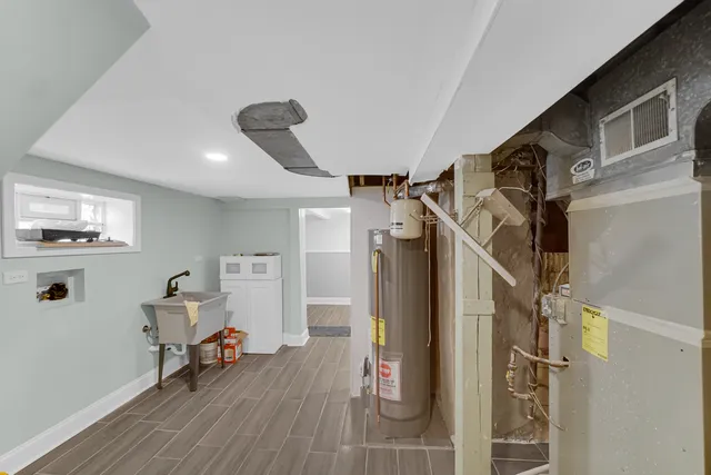 a room with furniture and wooden floor