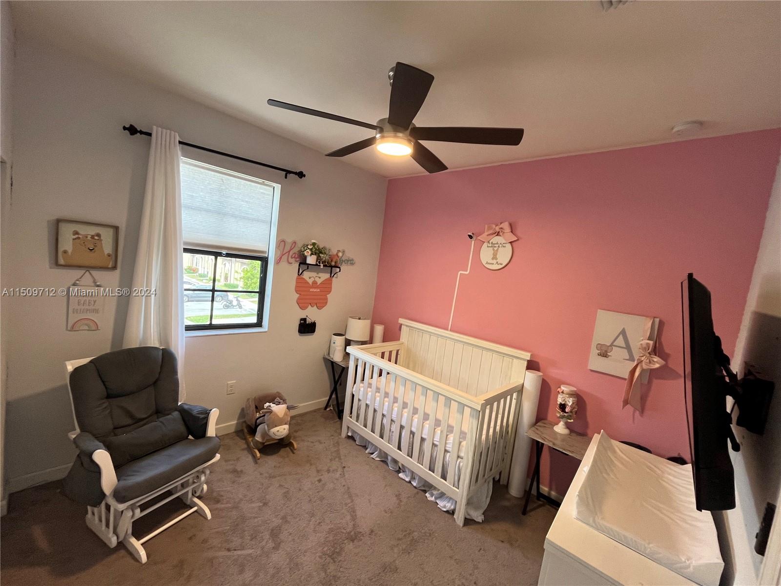 Hialeah Hialeah, FL 33018 - Photo 17 of 23 a bedroom with furniture and a window