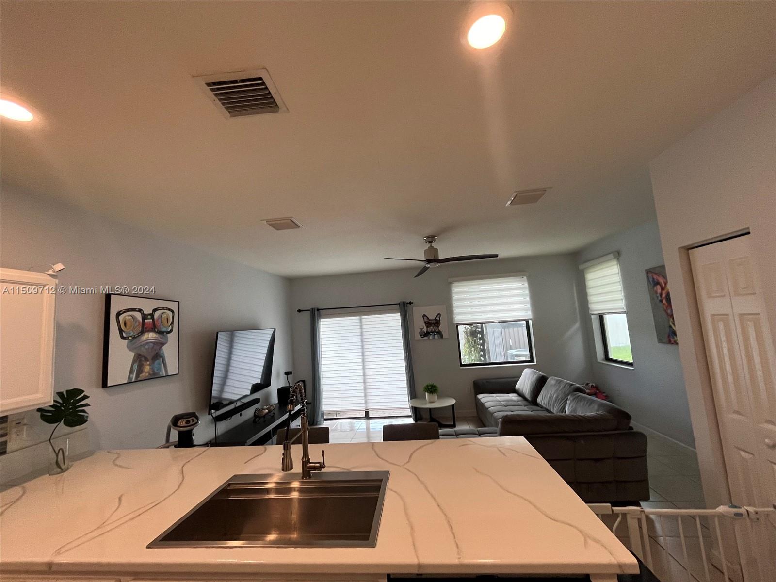 Hialeah Hialeah, FL 33018 - Photo 2 of 23 a room with gym equipment and a large window