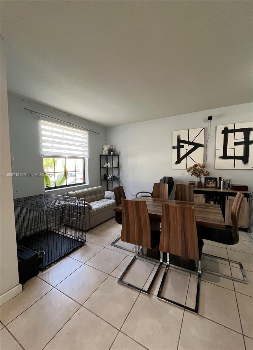 Hialeah Hialeah, FL 33018 - Photo 6 of 23 a living room with furniture and a window