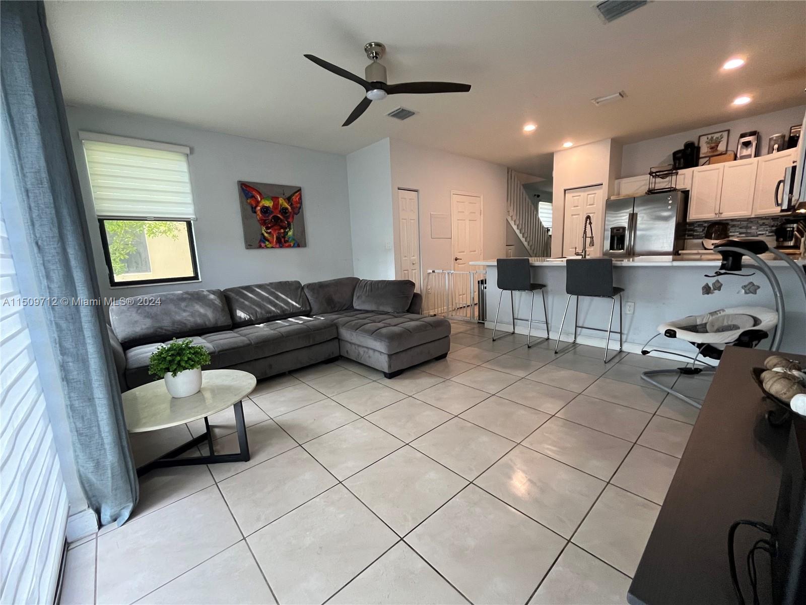 Hialeah Hialeah, FL 33018 - Photo 9 of 23 a living room with furniture and a window