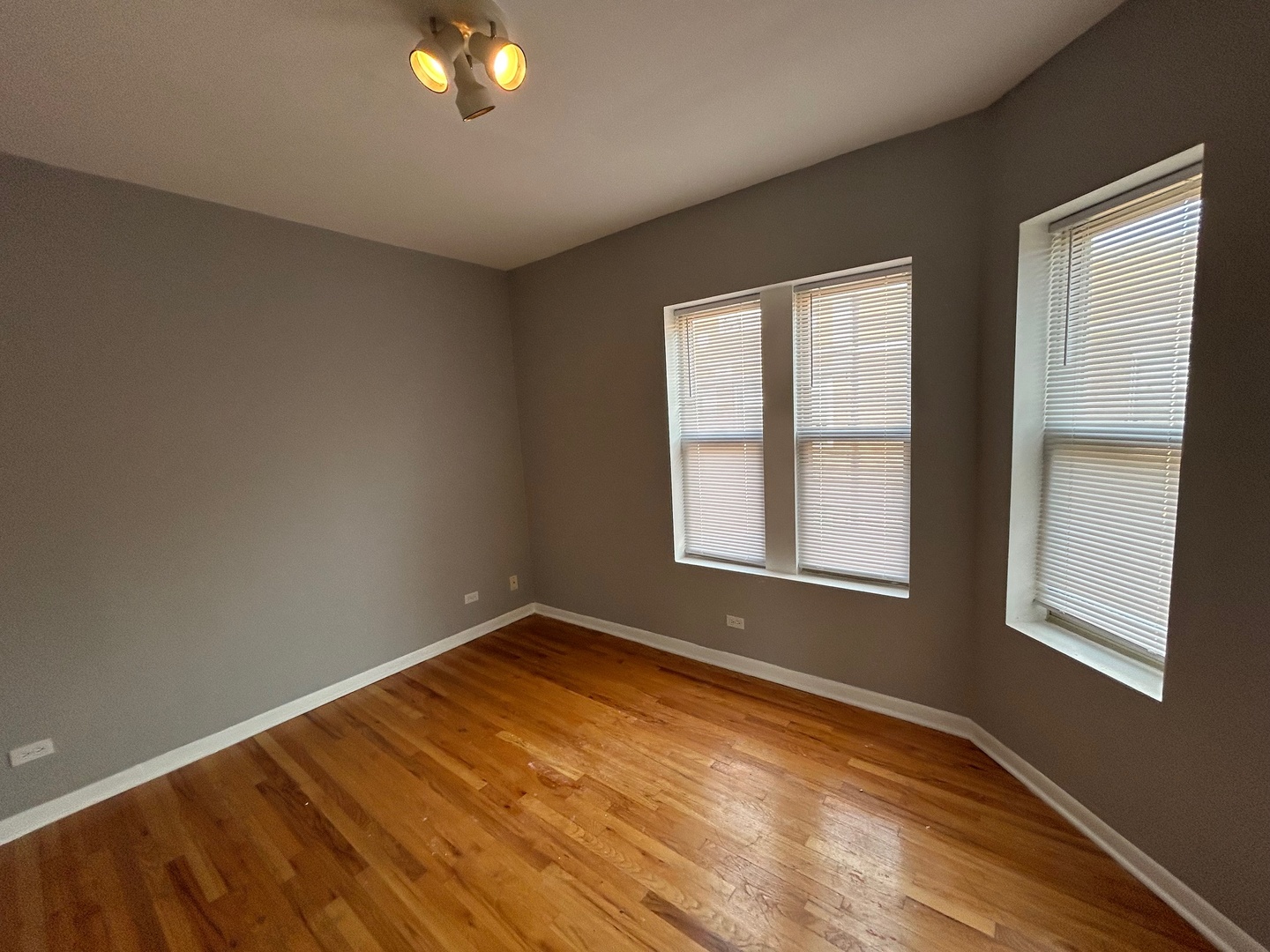8158 South Drexel Avenue, Unit 3 Chicago, IL 60619 - Photo 11 of 12 a view of an empty room with a window