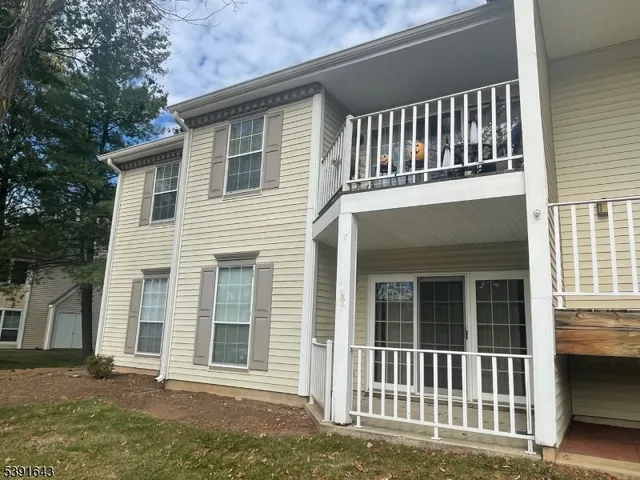 an empty room with balcony