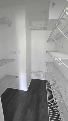 a view of a room with an empty space