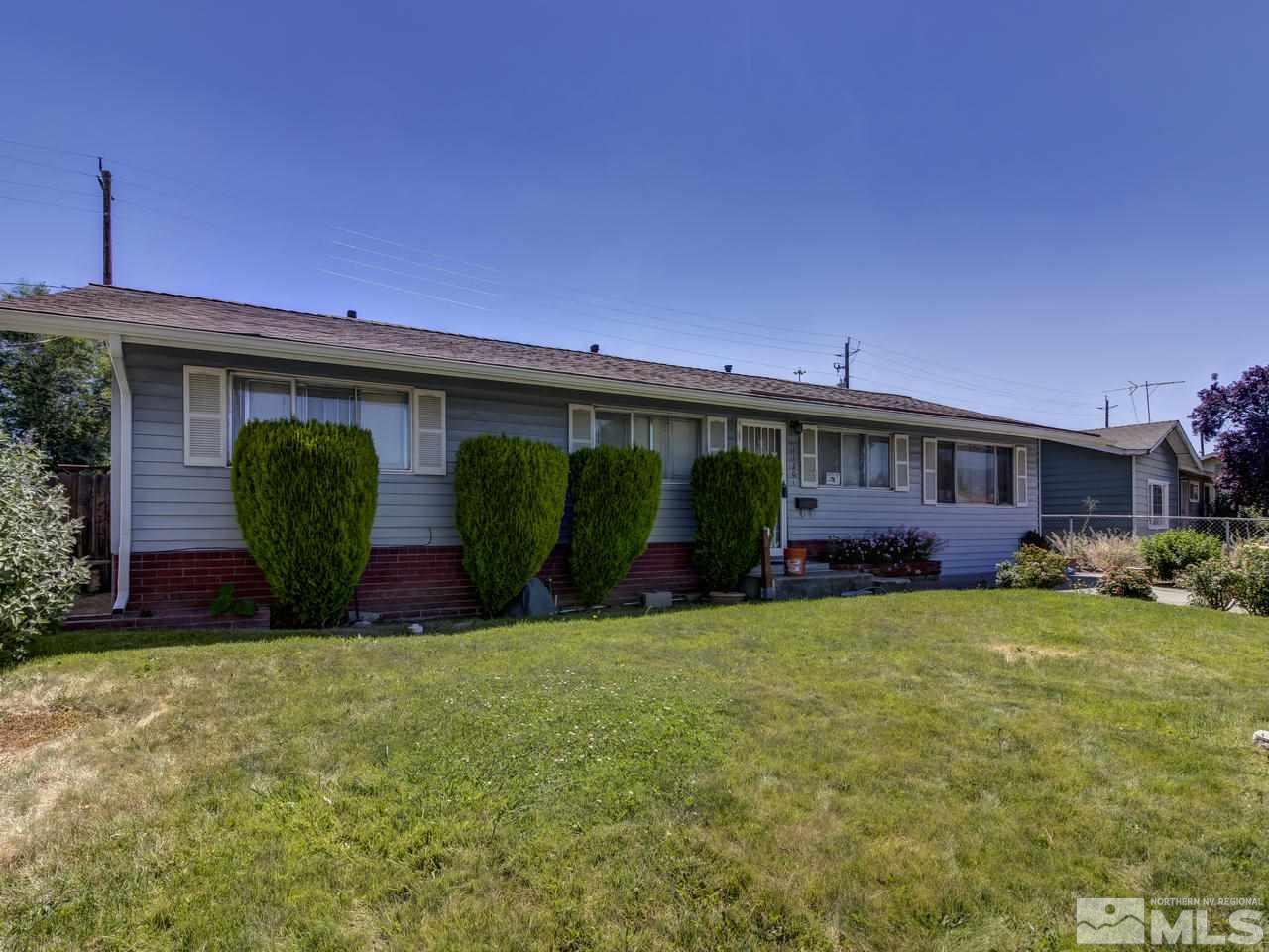 1120 Manhattan Street Reno, NV 89512 - Photo 1 of 23 a view of a house with backyard