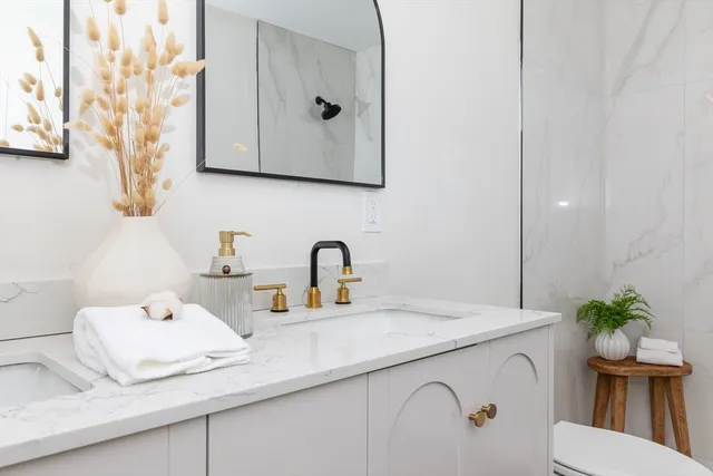 a view of backyard with large trees