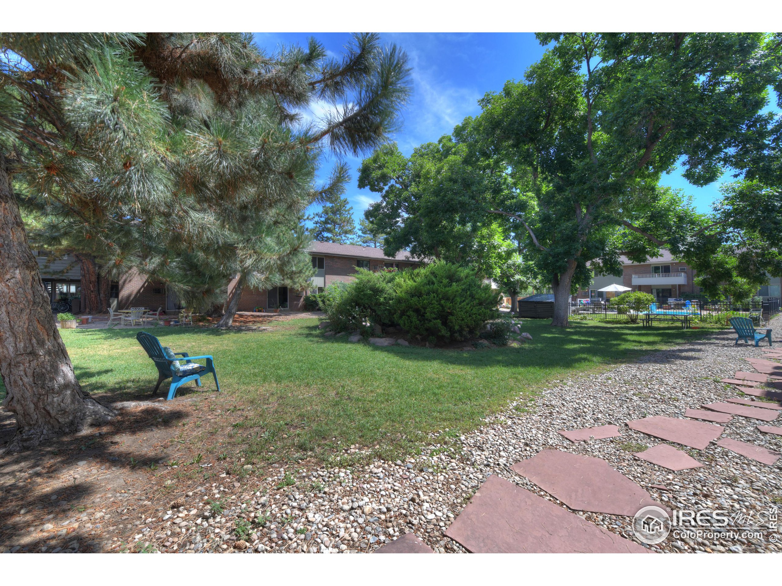 1895 Alpine Avenue, Unit E18 Boulder, CO 80304 - Photo 22 of 26 a view of a park with large trees
