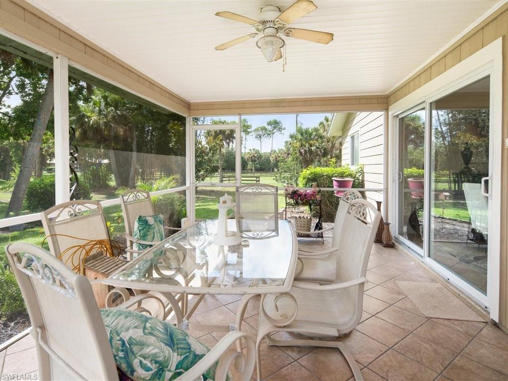 920 10th Street Southeast Naples, FL 34117 - Photo 13 of 16 a dining room with furniture water view and balcony