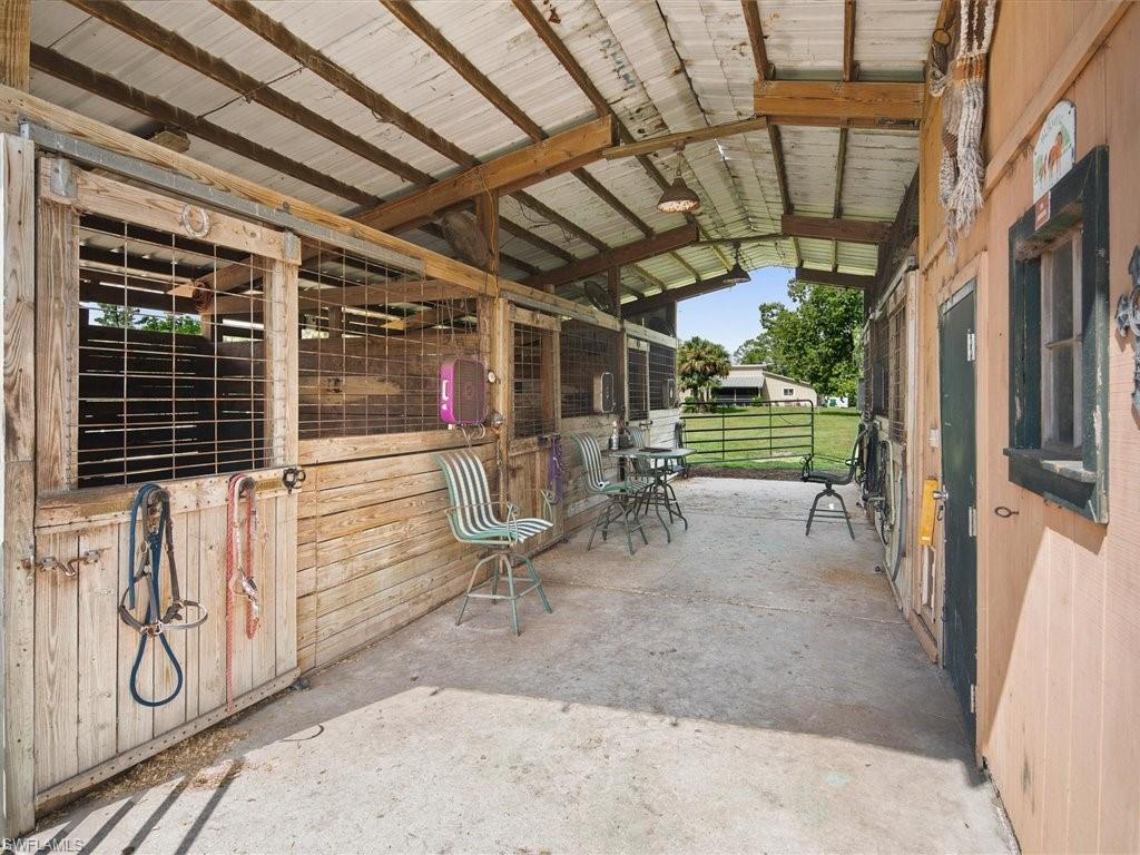 920 10th Street Southeast Naples, FL 34117 - Photo 2 of 16 a view of porch with seating space