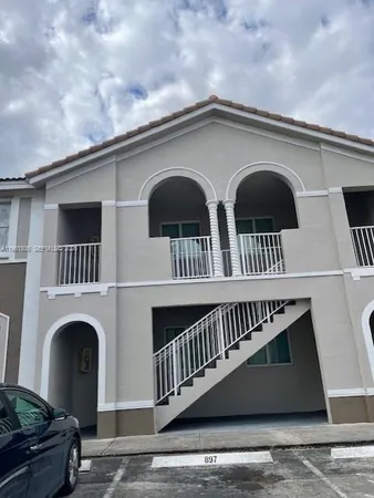 a front view of a house with balcony